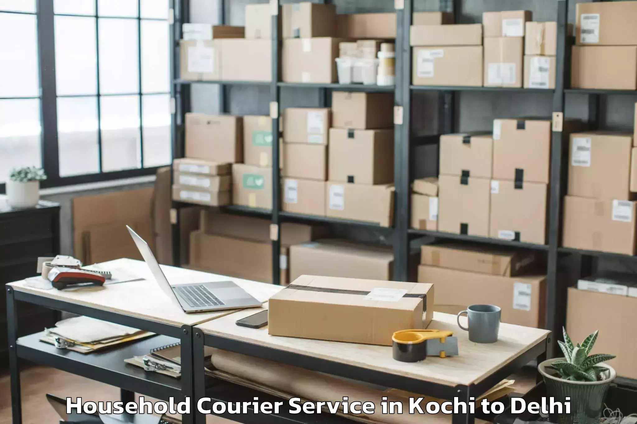 Book Kochi to Omaxe Connaught Place Household Courier Online